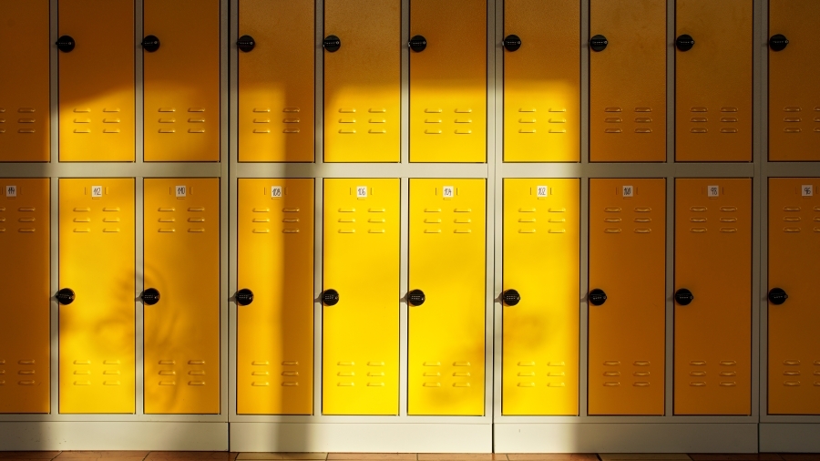 A row of yellow school lockers.